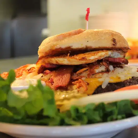 Breakfast burger with egg bacon cheese and lettuce